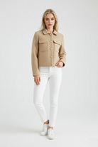Victoria women's khaki windbreaker jacket with lapel collar by Lumina Wear, featuring a sleek, stylish windbreaker for women.