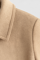Victoria women's khaki windbreaker jacket with lapel collar by Lumina Wear, stylish and lightweight for casual outdoor wear.