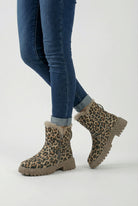 Lumina Wear Victoria leopard ankle boots with cozy lining, brown faux fur interior, stylish pointed toe, and low block heel.