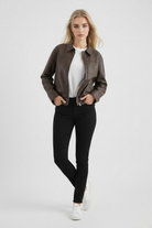 Brown Victoria loose fit aviator jacket for women by Lumina Wear, featuring a stylish collar and comfortable fit.