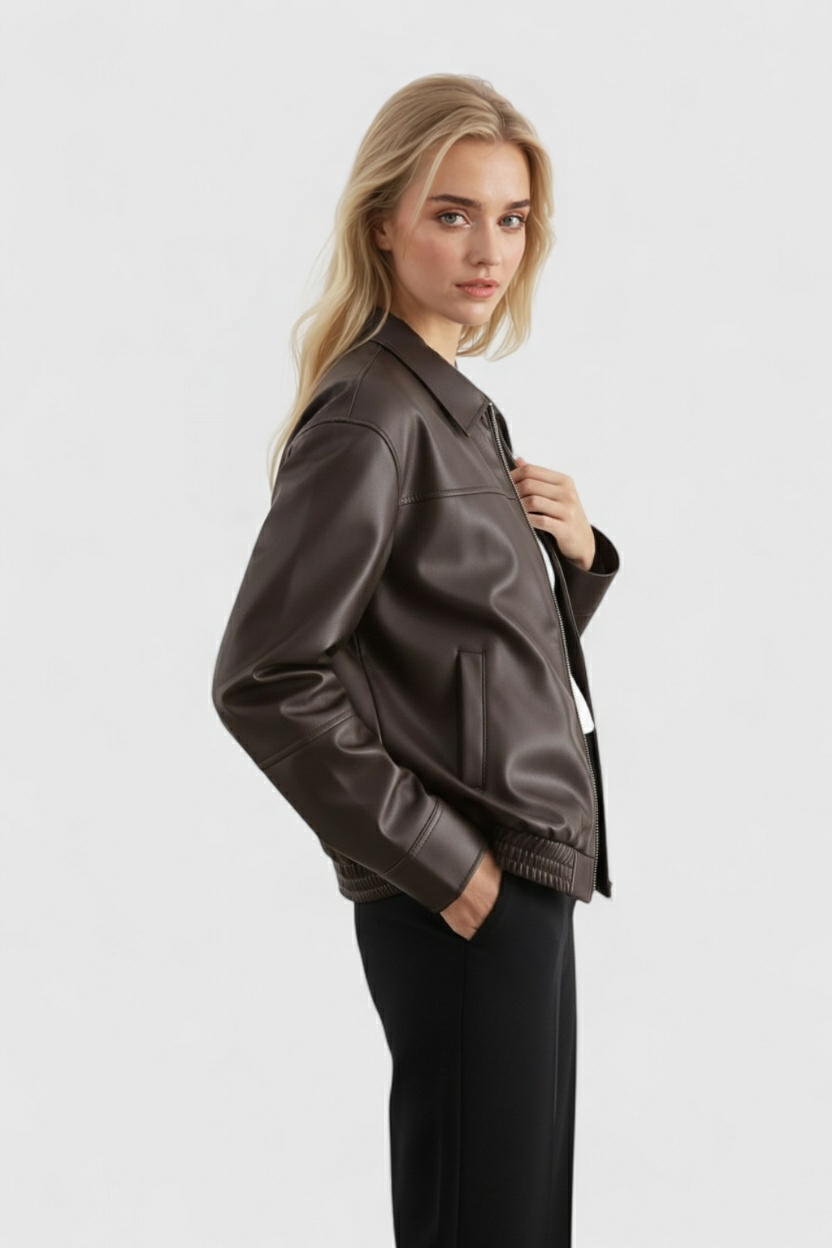 Brown loose-fit aviator jacket for women by Lumina Wear, featuring a stylish collar and zipper details.