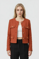 Lumina Wear Victoria women's short jacket in chic orange-red, featuring versatile style and trendy design.