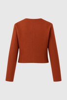 Lumina Wear Victoria chic orange-red short women's jacket with versatile style, shown on a model.