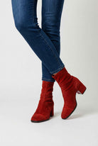 Red Victoria Lumina Wear women's mid-calf boots with chic retro style and statement heel, showcasing stylish footwear design.