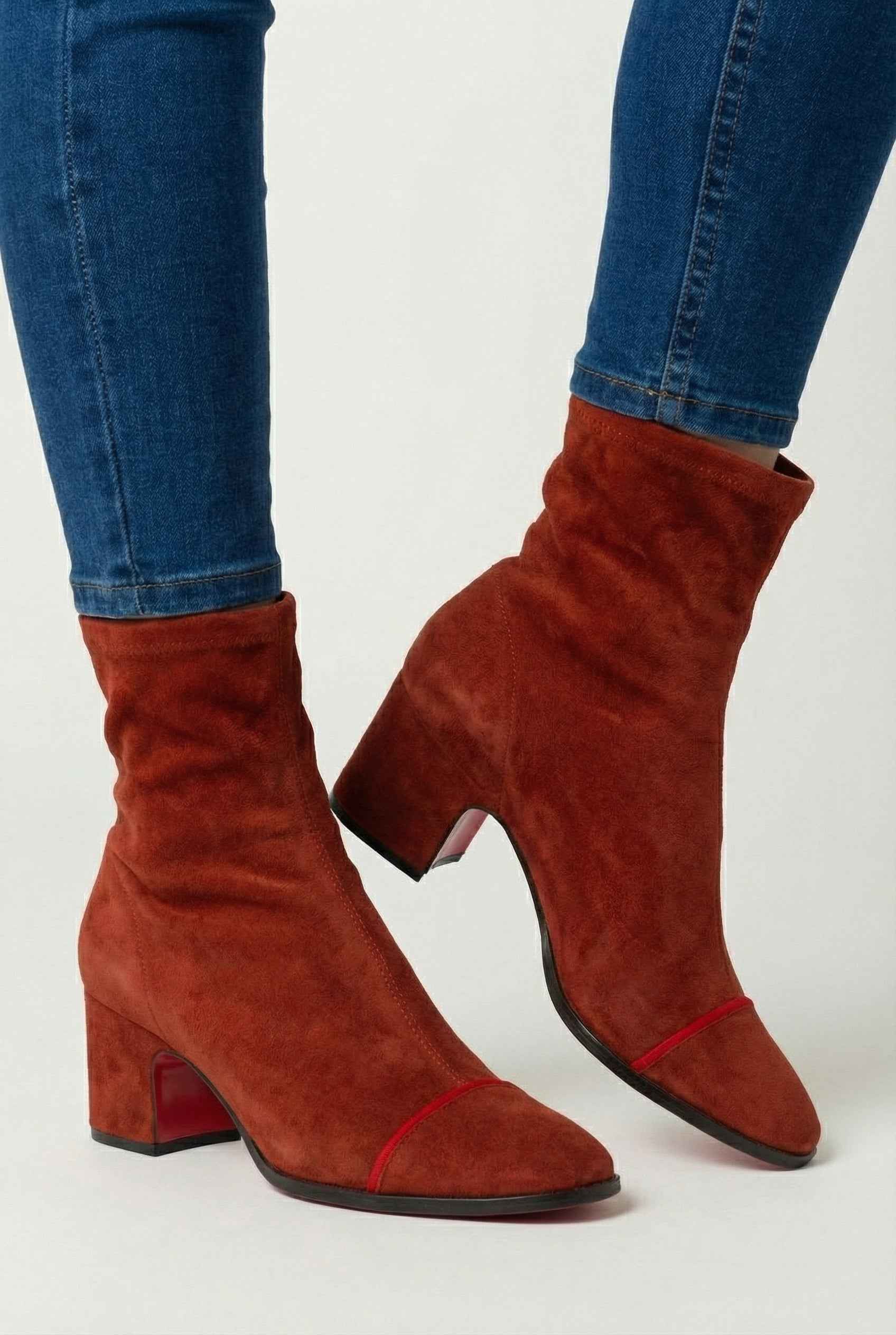 Red Victoria Lumina women's mid-calf boots with retro style and statement heel, showcasing sleek design and stylish ankle fit.