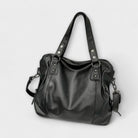 Beige Lumina Victoria structured hobo shoulder bag with dual straps, featuring a chic, modern design and elegant craftsmanship.