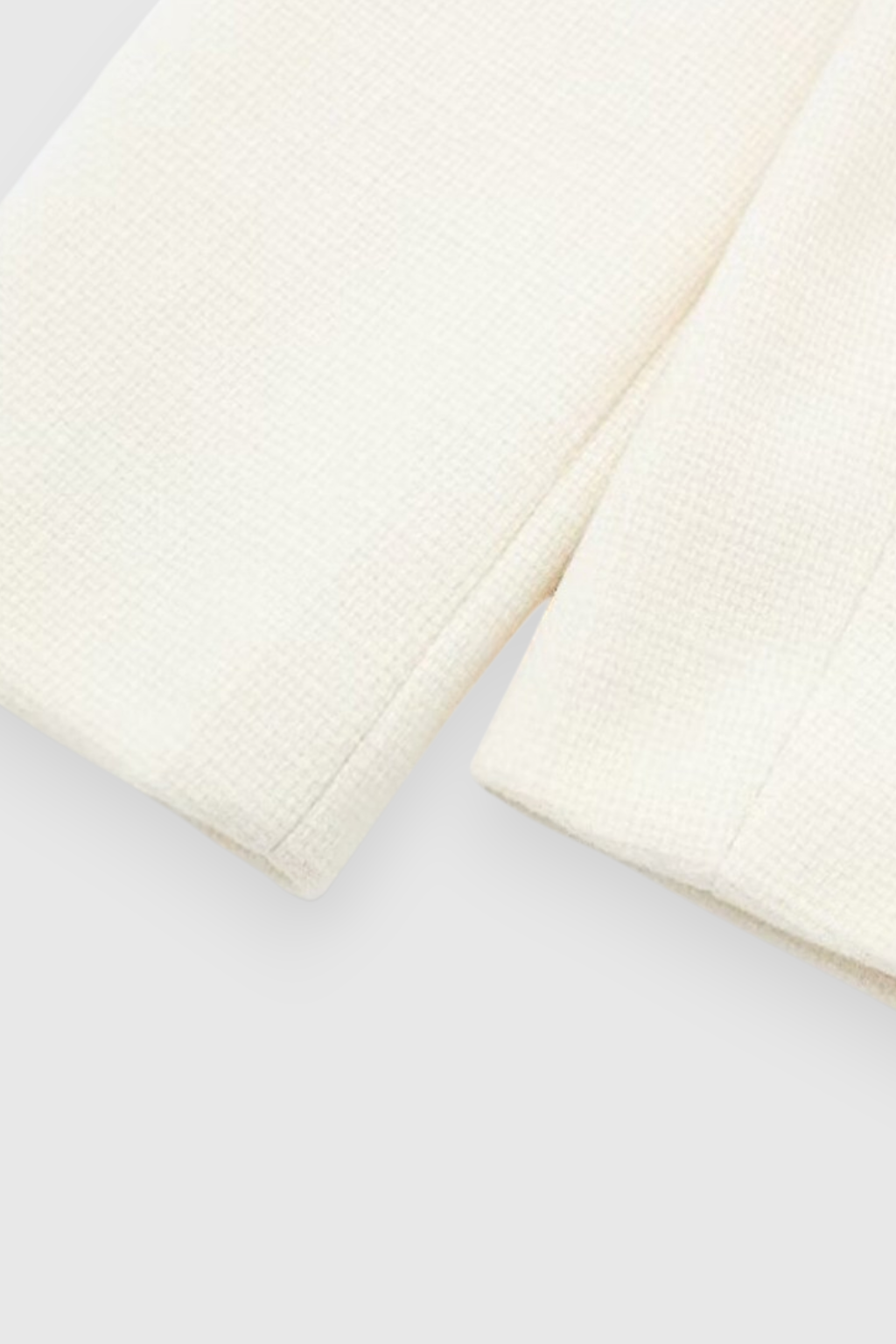 Lumina Wear Victoria white tailored short jacket with versatile style, featuring a chic, fitted design and clean white fabric.
