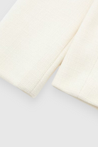Lumina Wear Victoria white tailored short jacket with versatile style, featuring a chic, fitted design and clean white fabric.