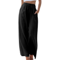 Victoria Lumina Wear wide-leg black trousers with a loose fit, showcased on a model, highlighting stylish and comfortable fashion.