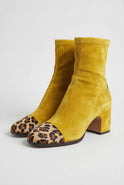 Victoria Lumina yellow mid-calf boots for women with warm lining, stylish footwear designed for comfort and fashion.