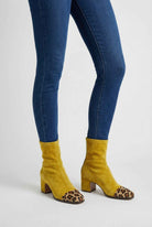 Victoria Lumina yellow mid-calf women's boots with warm lining, stylish design, and block heel for cold weather wear.