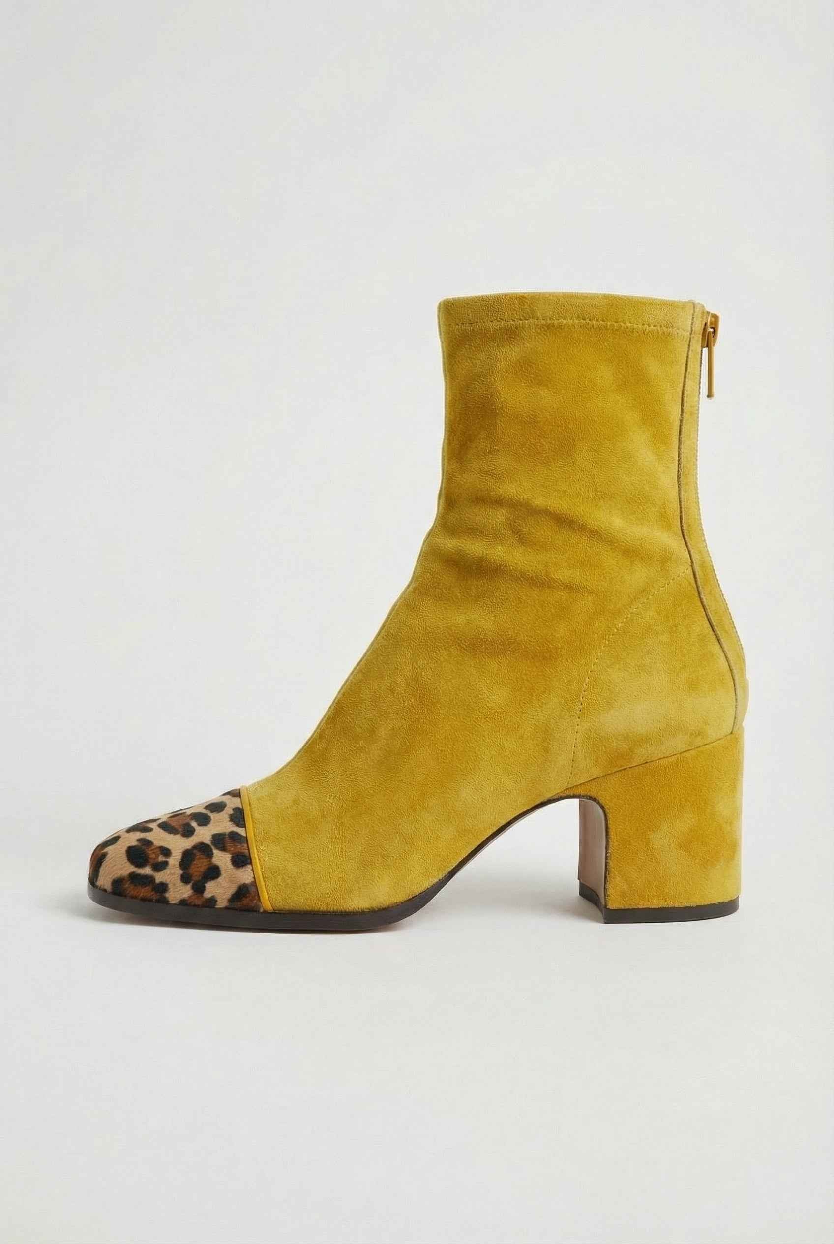 Victoria yellow mid-calf women's boots by Lumina Wear with warm lining, showing stylish design and bright yellow color.