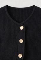 Victoria cozy black knit cardigan by Lumina Wear featuring ribbed details, designed for women's comfort and style.