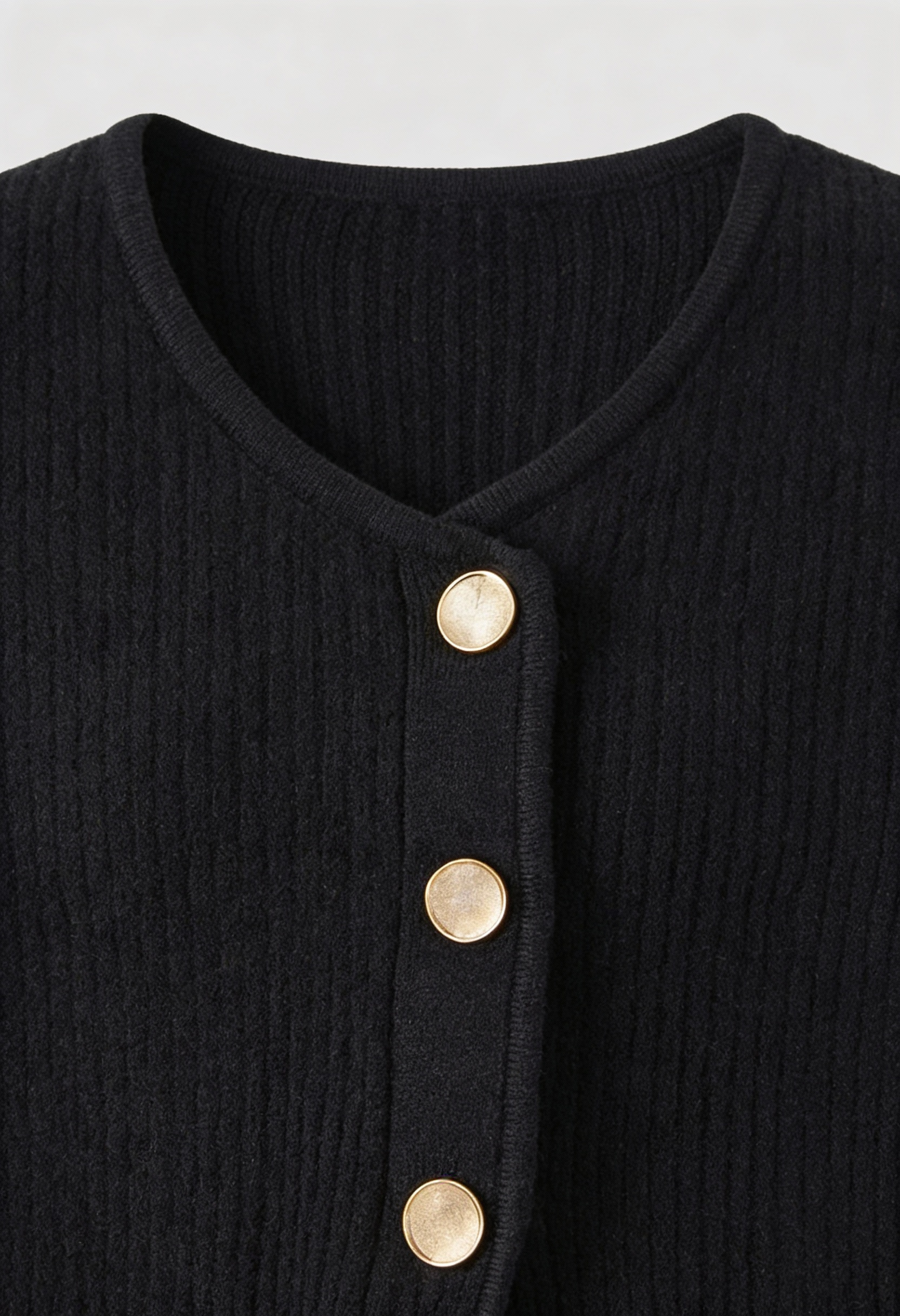 Victoria cozy black knit cardigan by Lumina Wear featuring ribbed details, designed for women's comfort and style.