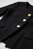 Black knit cardigan for women with ribbed details, from Lumina Wear's Victoria collection. Cozy and stylish women's cardigan.