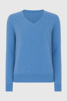 Blue Victoria Lumina Wear women's V-neck sweater featuring a cozy fit and flattering silhouette, perfect for casual wear.