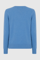 Blue Victoria Lumina Wear women's V-neck sweater with a cozy, flattering fit, perfect for casual and everyday wear.