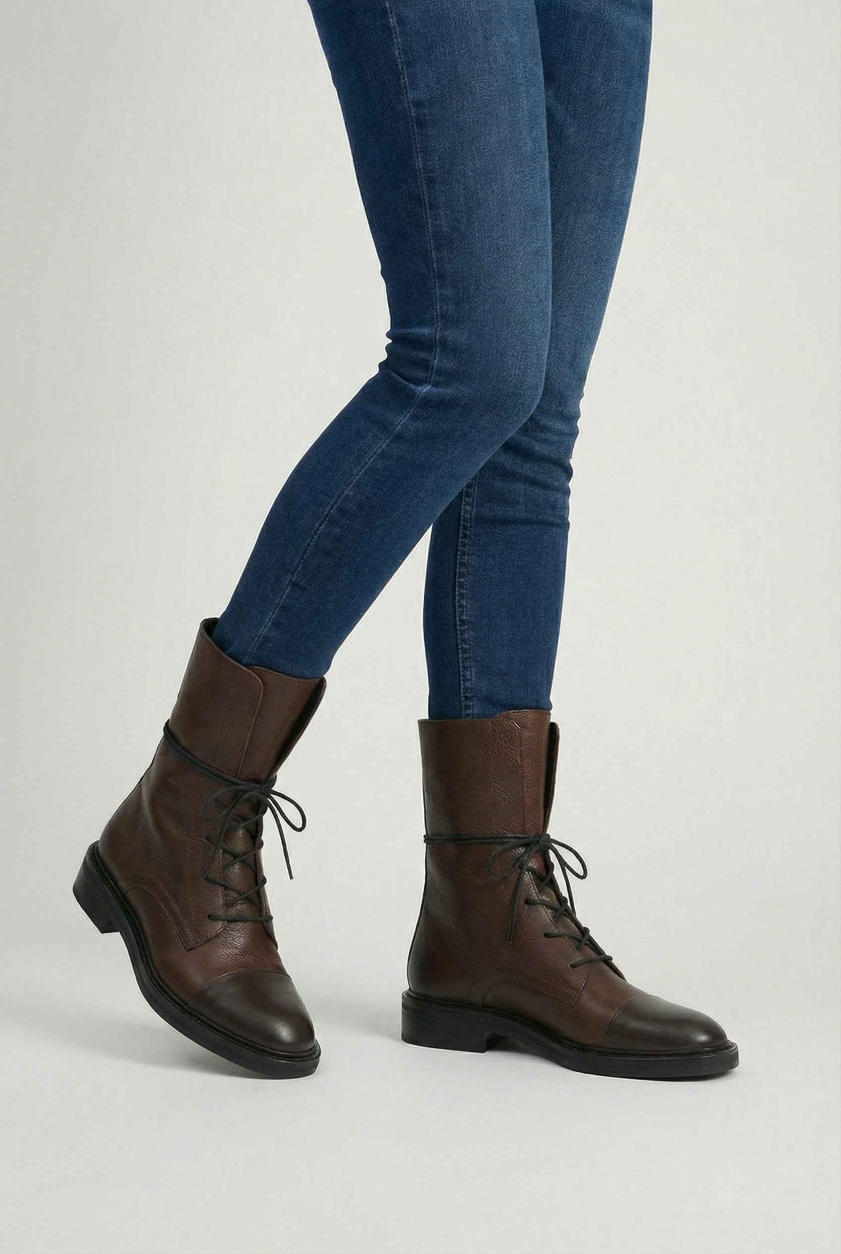 Dark brown Victoria Lumina Wear lace-up ankle boots with chic detailing and cozy design, perfect for stylish everyday wear.