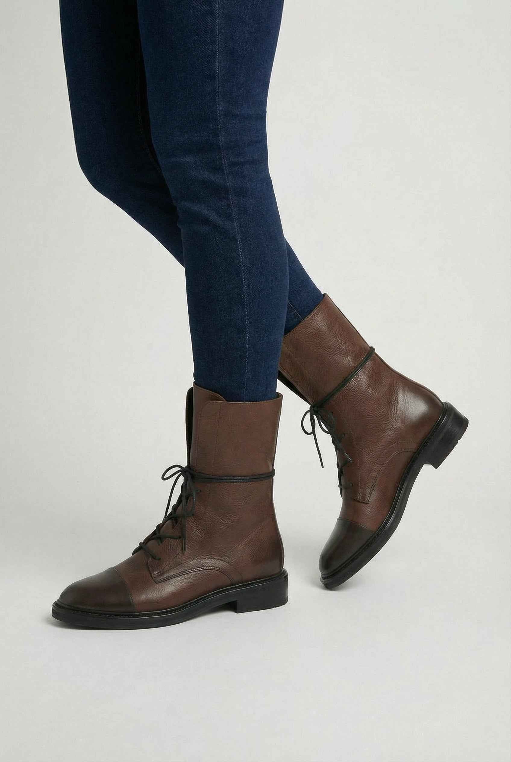 Dark brown Lumina Victoria lace-up ankle boots with chic detailing and cozy design, perfect for stylish fall and winter wear.