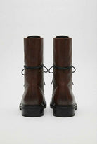 Dark brown Lumina Wear Victoria lace-up ankle boots with chic detailing and cozy design, perfect for stylish casual wear.