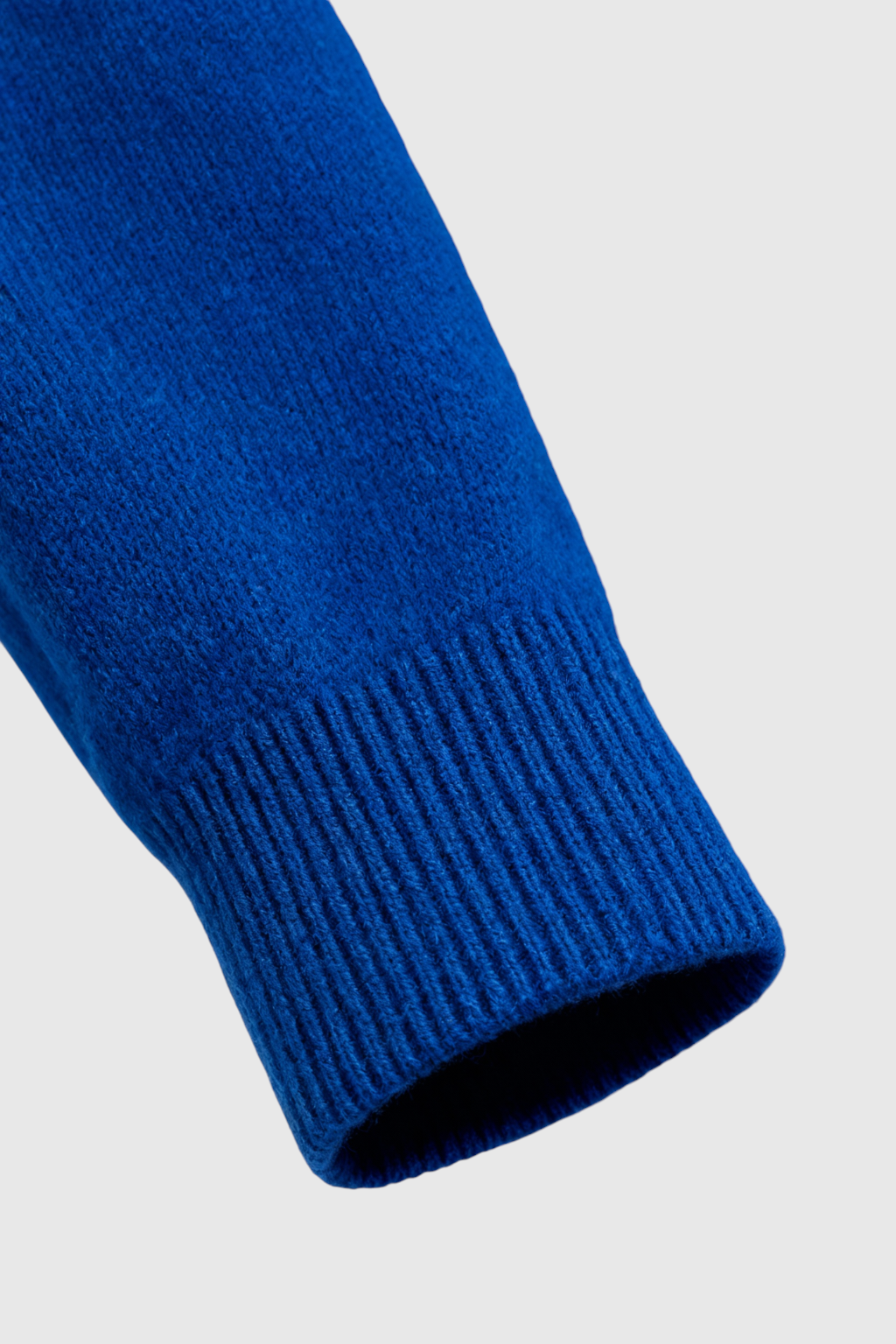 Dark blue Victoria Lumina Wear V-neck sweater with flattering fit, cozy knit, and long sleeves, casual and stylish for everyday wear.