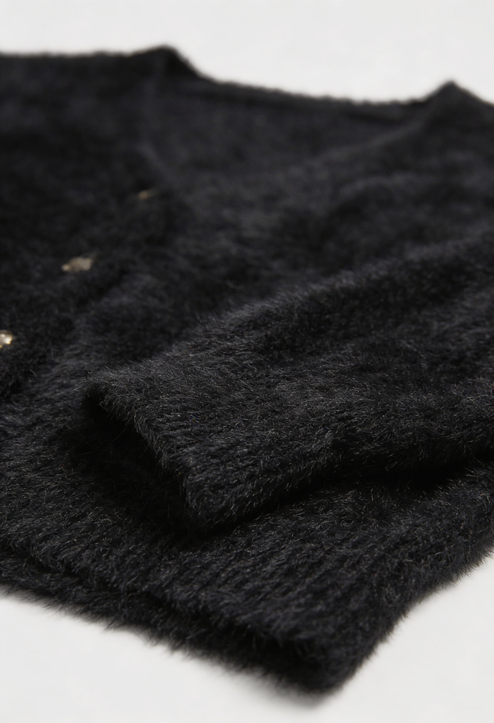 Victoria Lumina cozy long black cardigan sweater with open front design, featuring a relaxed fit and soft knit fabric.