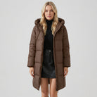 Red reddish-brown Lumina Wear Victoria longline hooded puffer coat with practical pockets, cozy and stylish for cold weather.