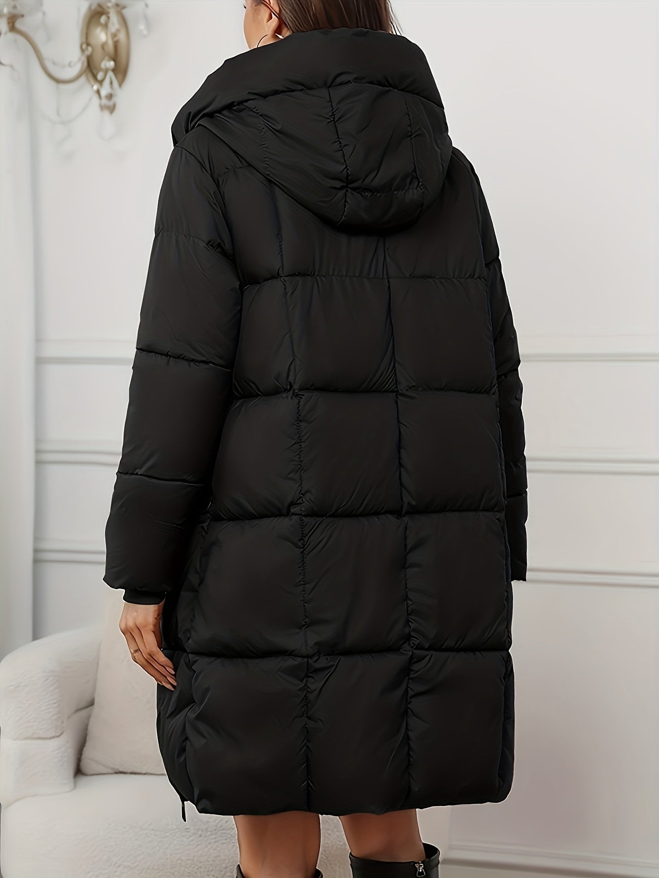 Redish-brown Lumina Wear Victoria cozy longline hooded puffer coat with practical pockets, designed for warmth and comfort.