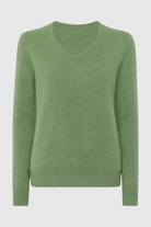 Olive green Lumina Wear Victoria cozy sweater with a flattering V-neck, soft knit fabric, and relaxed fit.