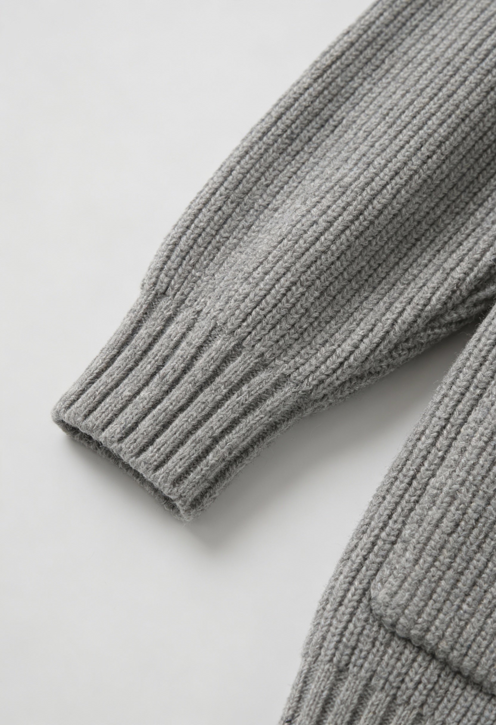 Grey Victoria Lumina Wear oversized long cardigan with ribbed details, cozy sweater perfect for layered winter style.