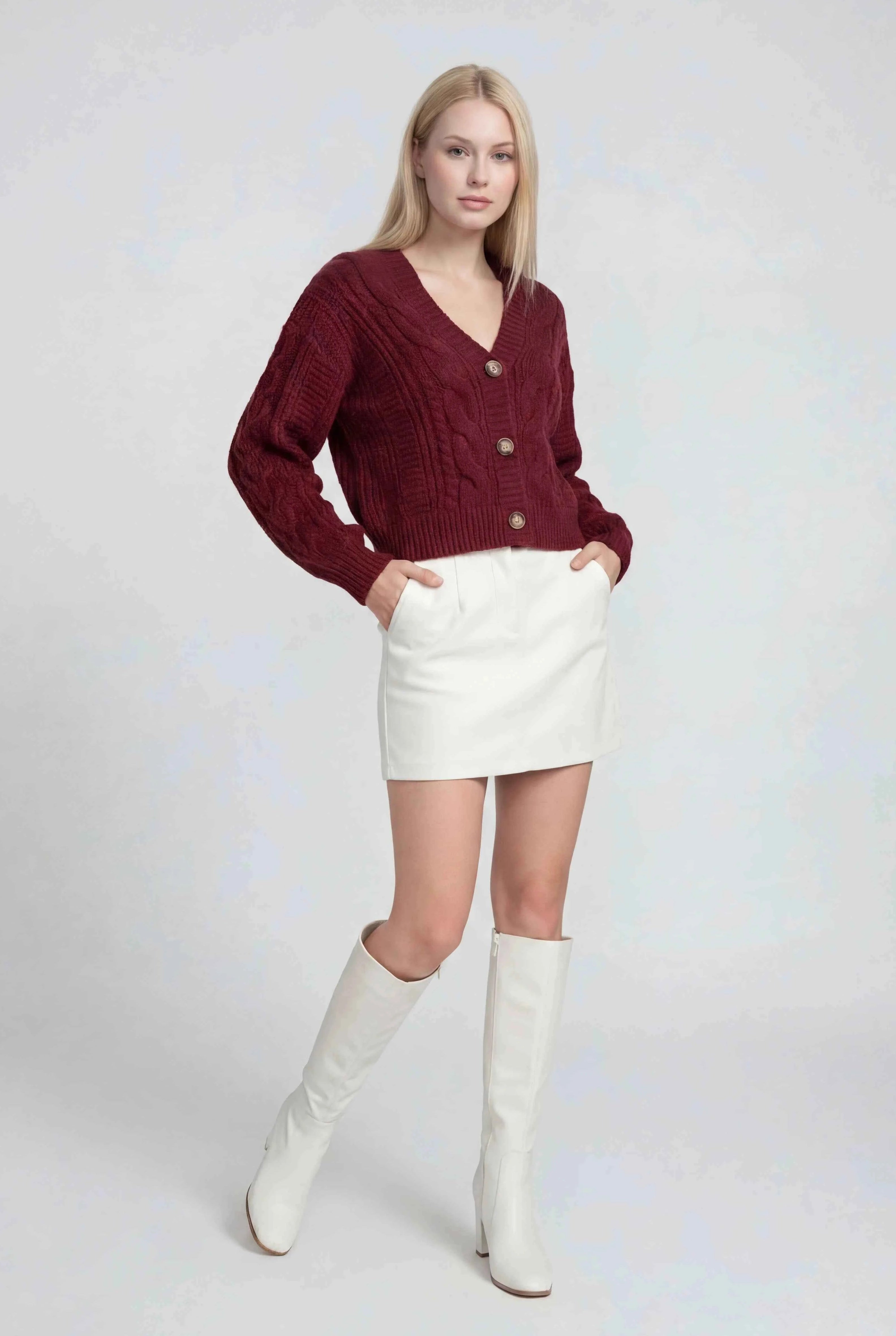 Victoria Cozy Red Long Cardigan by Lumina Wear with ribbed details, shown draped on a model in a casual setting.