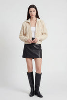 Victoria cozy white knit cardigan sweater with relaxed fit by Lumina Wear, featuring soft textured fabric and casual style.