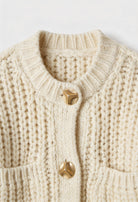 Victoria cozy white long cardigan sweater by Lumina Wear, featuring a relaxed fit and soft knit fabric.
