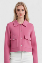 Elegant apricot women's jacket from Lumina Wear featuring a classic button closure and tailored fit.