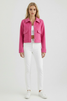 Elegant apricot Lumina Wear women's jacket with classic button closure, stylish and lightweight for a sophisticated look.