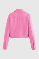 Elegant apricot Lumina Wear women's jacket with classic button closure, featuring a tailored fit and stylish design.