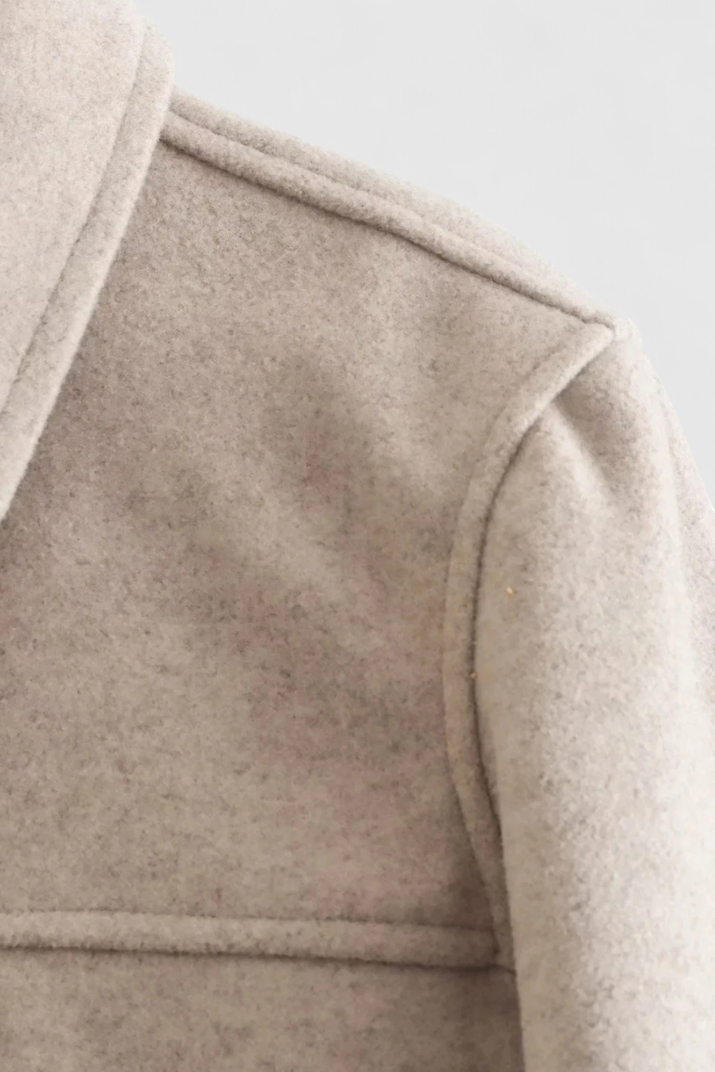 Lumina Wear Victoria elegant autumn jacket with classic button closure in apricot color, stylish and lightweight for chilly days.