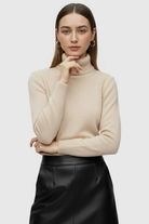 Beige Lumina Wear Victoria slim fit turtleneck sweater for winter, elegant design, close-up of fabric and neckline.