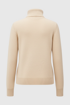 Elegant beige Lumina Wear turtleneck sweater for winter, slim fit design, casual style, soft knit fabric, front view.