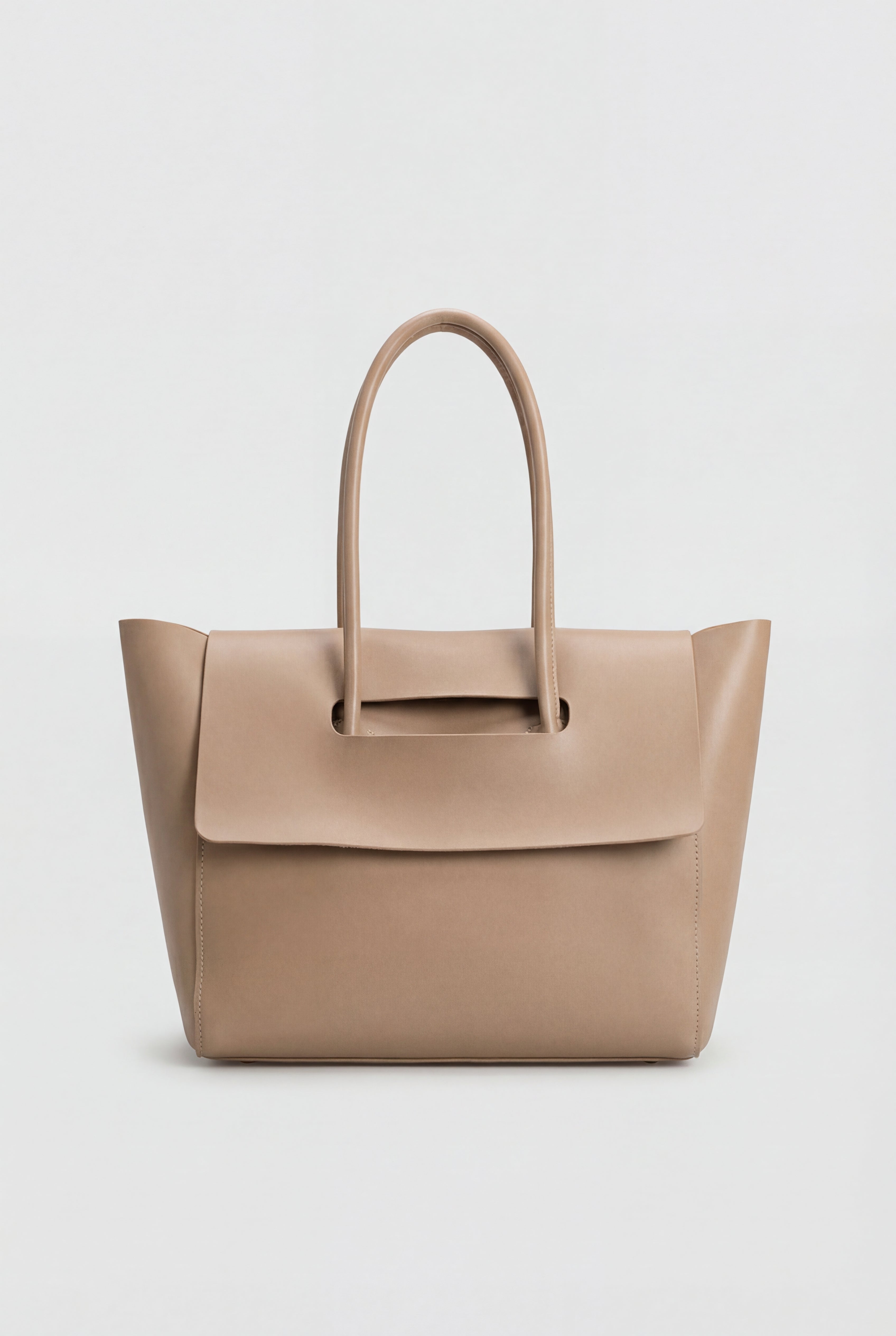 Elegant black Lumina Wear Victoria handbag with adjustable strap, featuring a sleek design and spacious interior.