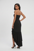 Elegant black Maxi Dress by Lumina Wear featuring an asymmetrical ruffle and flowing silhouette.