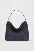 Lumina Wear Victoria black suede tote bag with a spacious design, elegant and stylish for daily use.