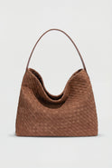 Elegant black suede tote bag by Lumina Wear featuring a spacious design and top handles, perfect for everyday use.