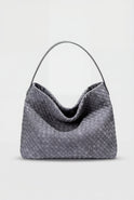 Elegant black suede tote bag by Lumina Wear featuring a spacious design and stylish handbag for everyday use.
