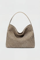 Lumina Wear Victoria black suede tote bag showing its spacious design and elegant look, perfect for stylish everyday use.