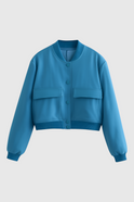 Elegant blue Victoria bomber jacket by Lumina Wear featuring a timeless design, shown on a model with front view.