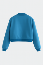 Elegant blue bomber jacket from Lumina Wear featuring a timeless design, shown on a model.