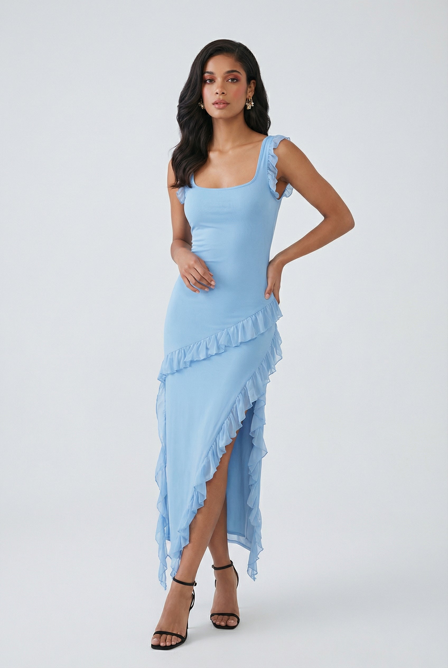 Elegant blue evening maxi dress by Lumina Wear featuring a high slit, fitted bodice, and flowing fabric for formal occasions.