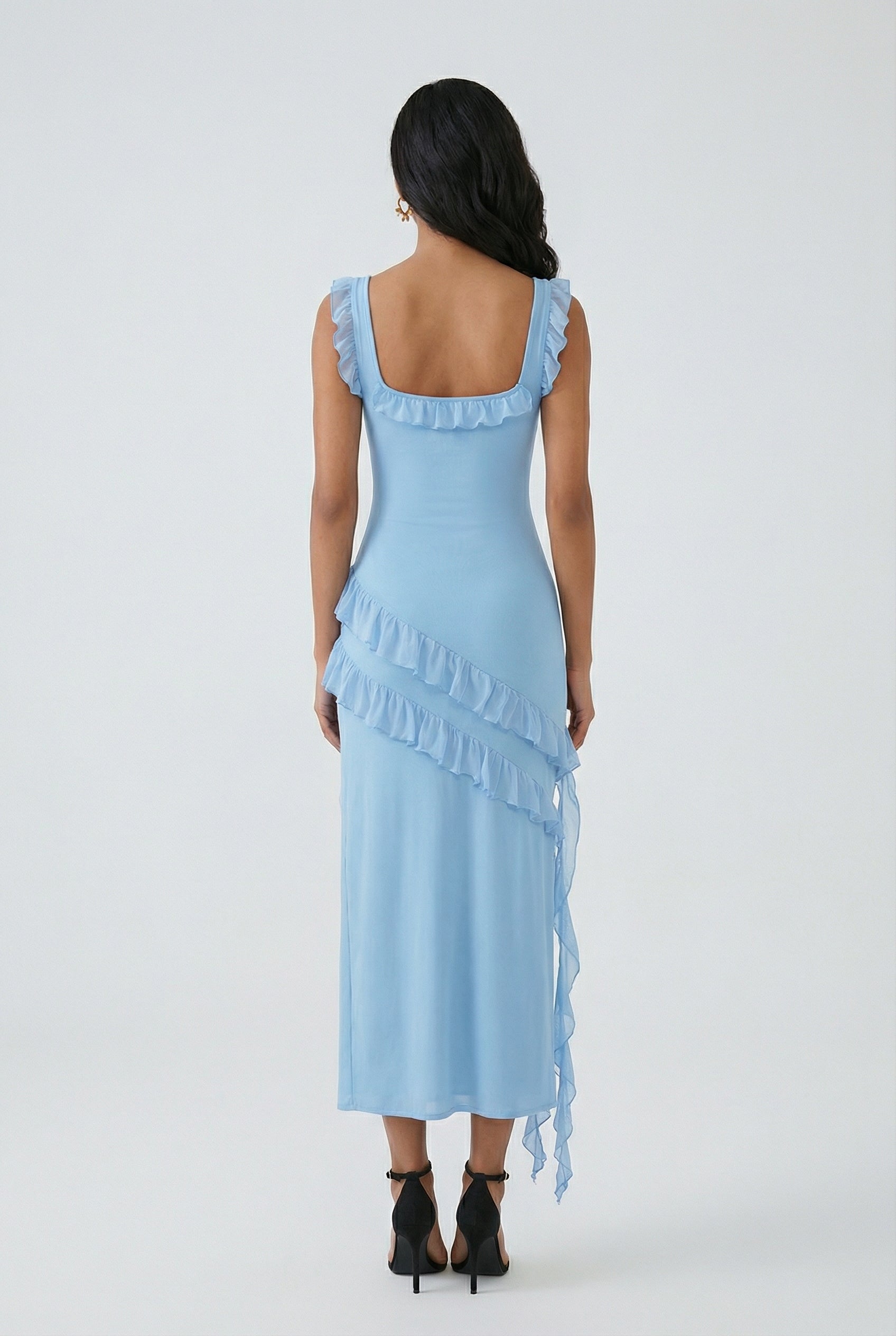 Elegant blue Victoria evening maxi dress with high slit by Lumina Wear, featuring flowing fabric and sophisticated style.