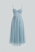 Elegant blue midi wedding guest dress by Lumina Wear featuring a flattering silhouette and stylish design.